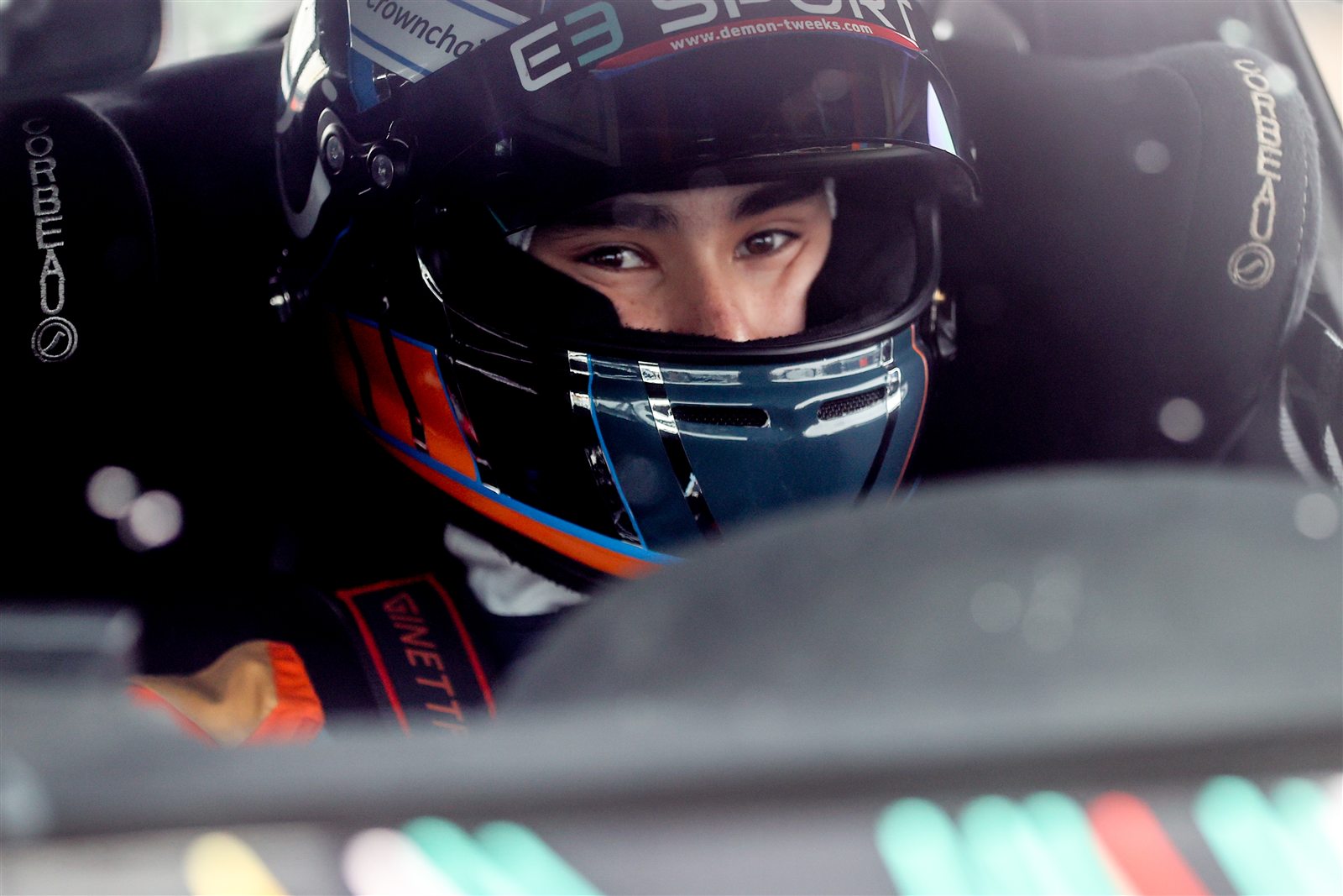 Andrew Robinson focused inside the Ginetta G56 GTA cockpit
