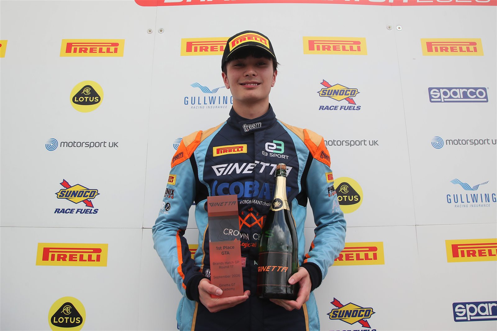 Andrew Robinson celebrating a first-place GT Academy class finish at Brands Hatch